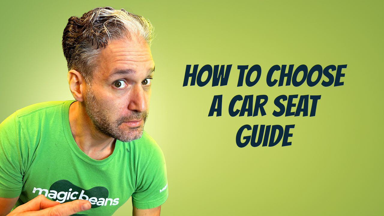 Eli Gurock, renowned child gear expert, and founder of Magic Beans is pictured here with a how to choose a car seat guide with babyark